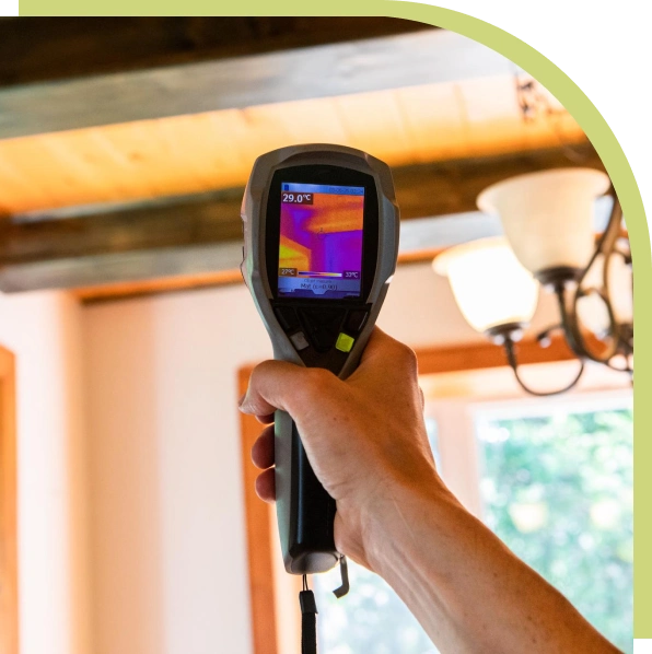Thermal imaging camera showing heat loss in a home ceiling